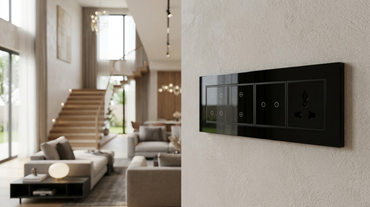 AZIOT 8 module all-touch smart switch board in a modern Indian villa living room