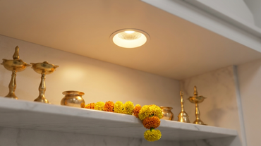 AZIOT smart COB light giving a warm glow in an Indian pooja room