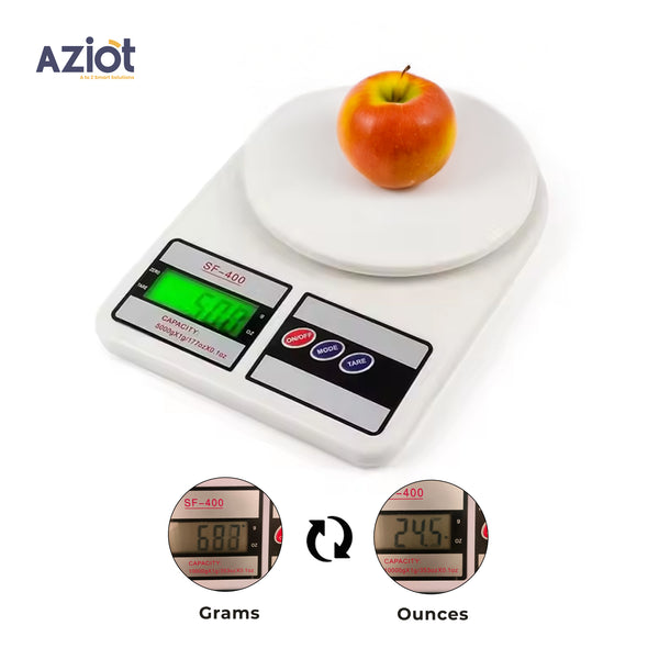 A white digital kitchen weighing machine with an LCD screen, showing a red apple on the platform and the ability to display measurements in both grams and ounces.